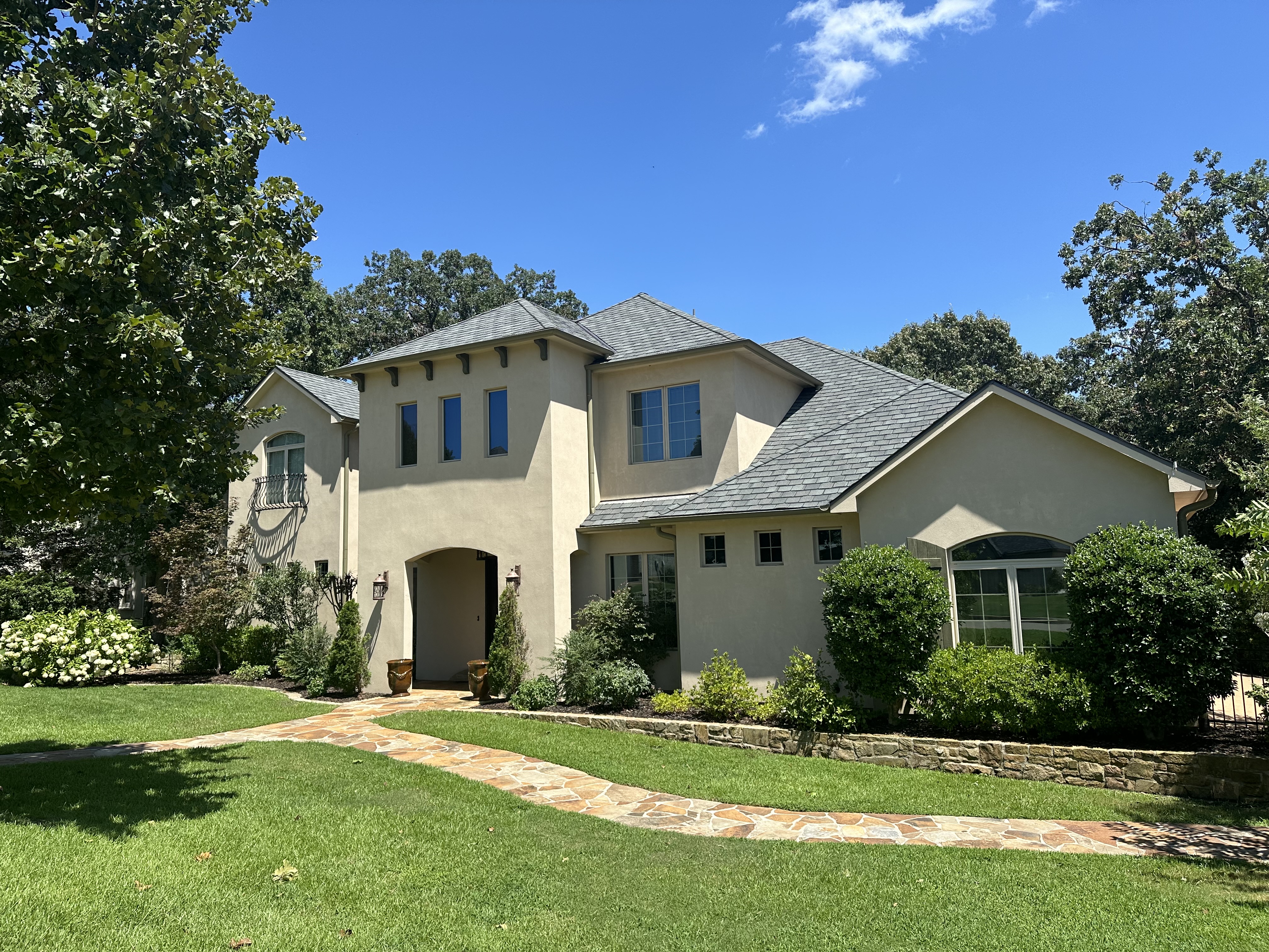 Two-story East Texas home with new shingle roof